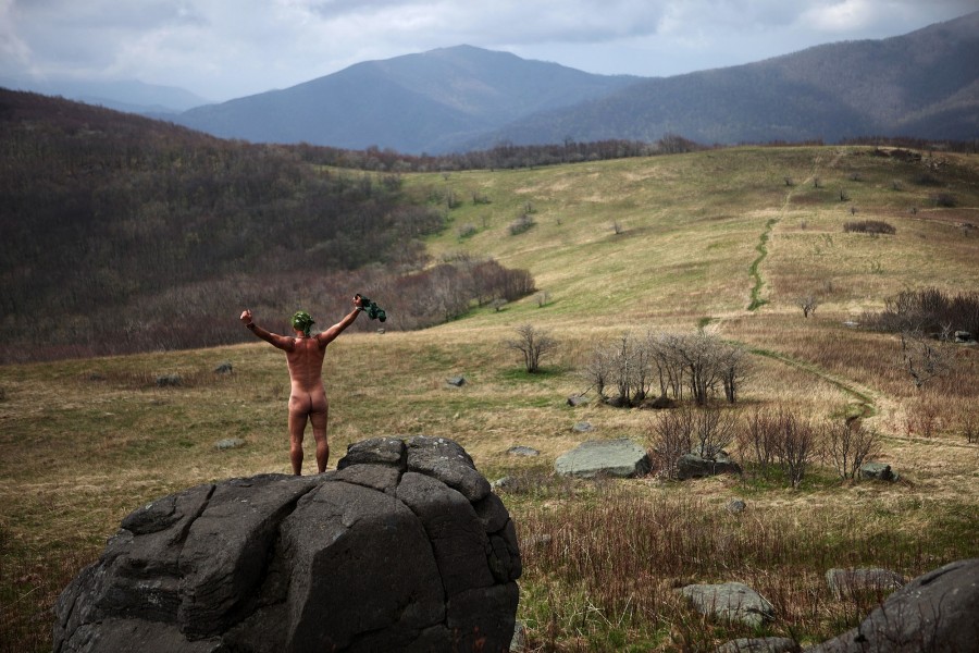 Tad Fin Paavola waves his underware in his hands and yells into the wind along the AT in NC