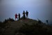 hikers watch the moon rise from a mountaintop in maine along the appalachian trail