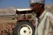 a tractor and a farmer in Palestine
